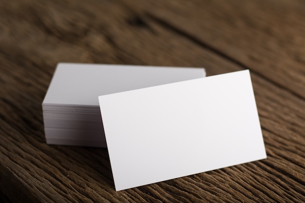 Free Photo blank white business card presentation of corporate identity on wood background