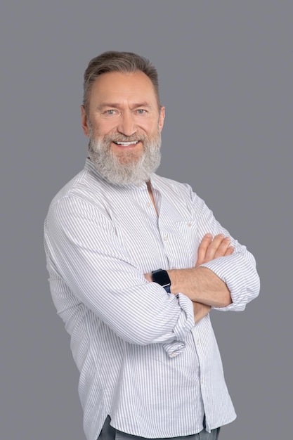 Free Photo male businessman in a white shirt looking confident