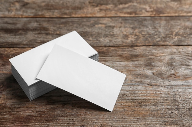 Photo blank business cards on wooden background